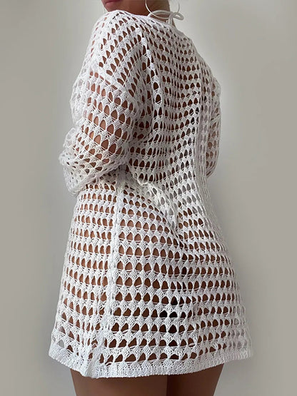 Knitted hollowed out pullover round neck long sleeved bikini swimsuit cover