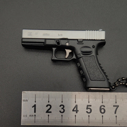 New Empire 1:3 Glock G17 alloy keychain, realistic gun model with detachable soldier gear & bullets.