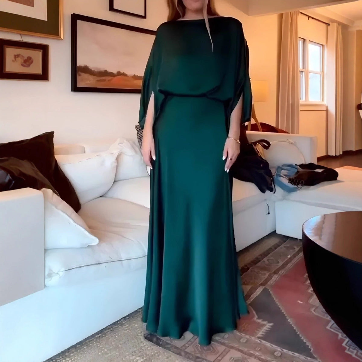 A Sleek Solid-color Satin Dress With Smooth Lines