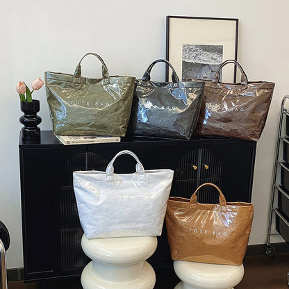 Vintage PVC tote with DuPont lettering. Simple, transparent, large - capacity handbag for commuting women.