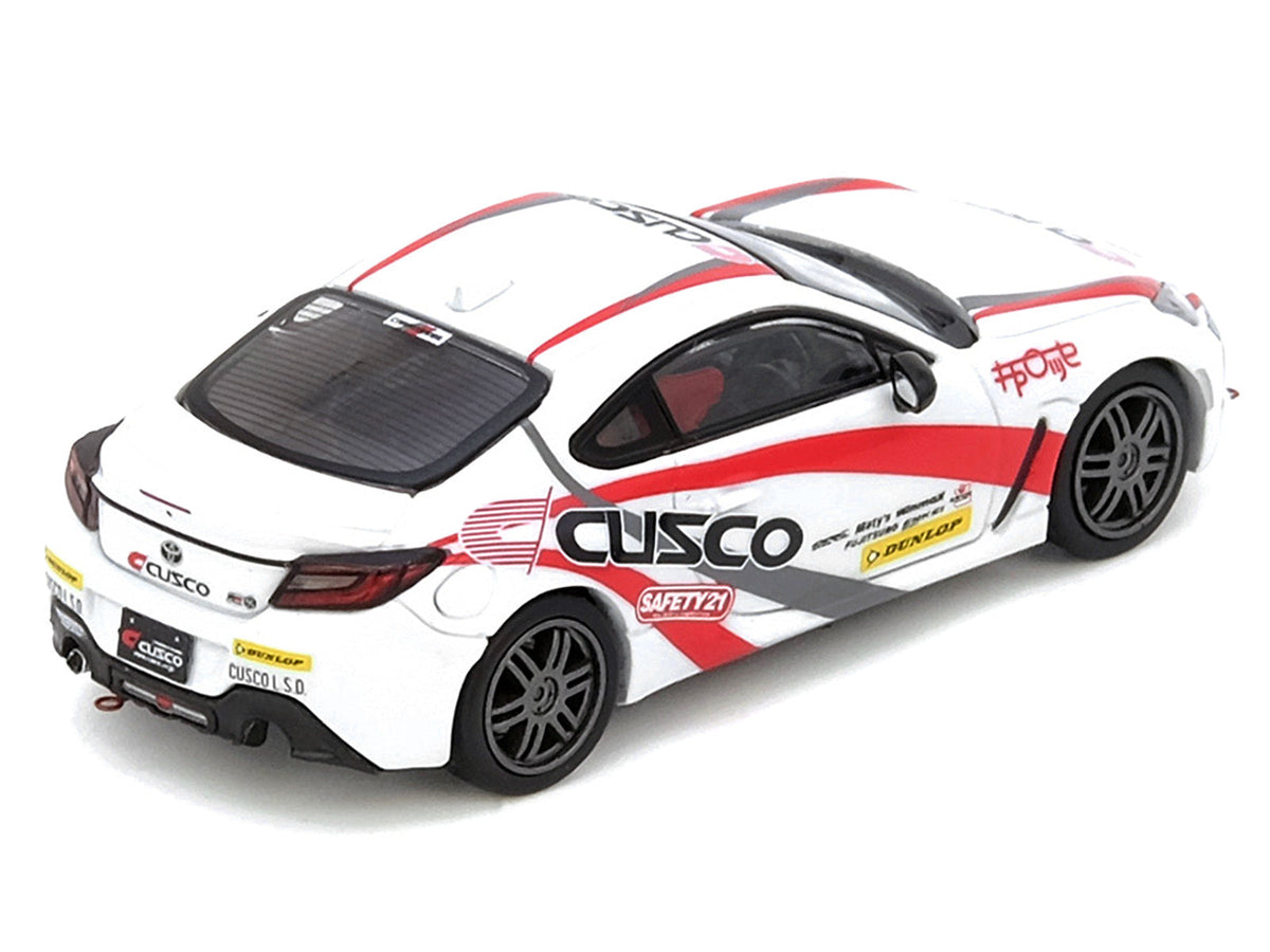Toyota GR86 Tuned by "CUSCO" RHD (Right Hand Drive) White with Red and Gray Stripes 1/64 Diecast Model Car by Inno Models