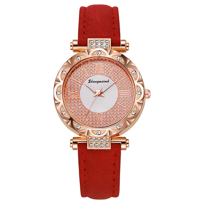 Korean-style quartz watch with a simple leather strap.