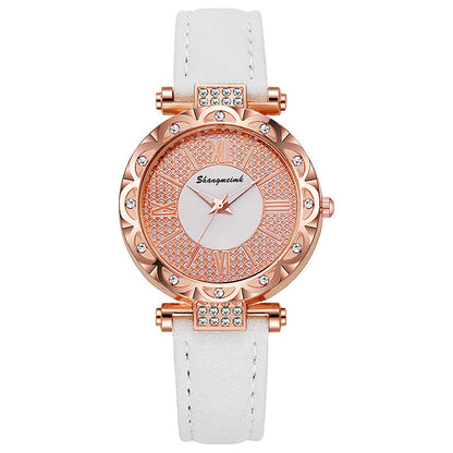 Korean-style quartz watch with a simple leather strap.