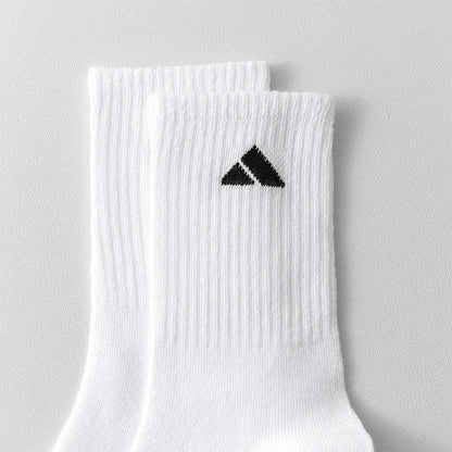 5 Pairs of Black and White Patterned Mid Length Socks Suitable for Both Men and Women Comfortable and Unisex Sports Socks