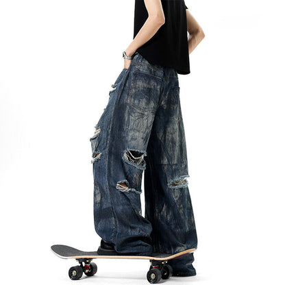 Mens Dirty Stained And Ripped Jeans