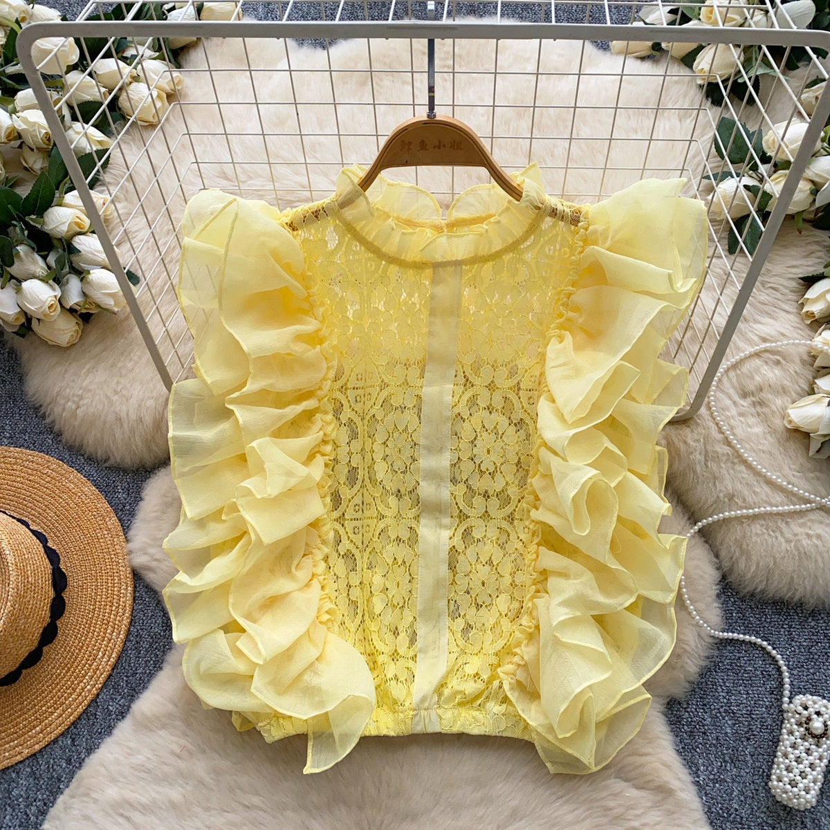 Lace Sleeveless Top With Ruffled Paneling And Hollowed-Out Details